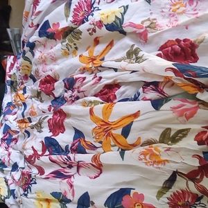 Multi colored flower print  Guess wide leg pants. Leg width 20"